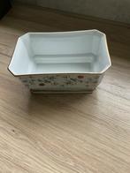 Porseleinen bloempot, Ophalen