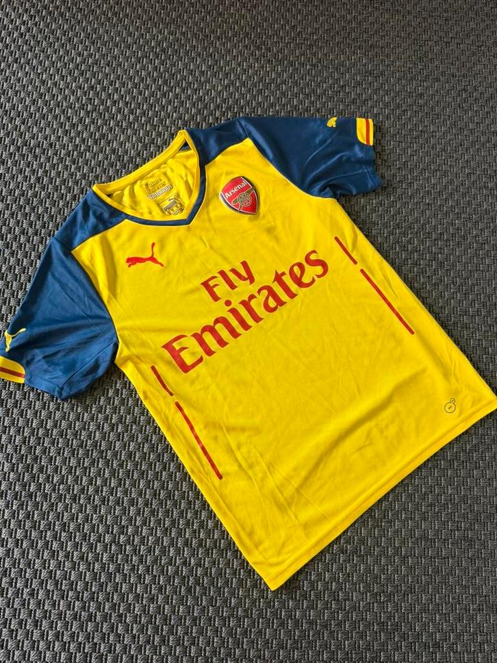 Arsenal Uitshirt 2014/15 – Geel/Blauw – Puma – Fly Emirates, Sport en Fitness, Voetbal, Gebruikt, Shirt, Maat XS of kleiner, Ophalen of Verzenden