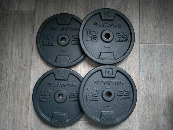 4 x 10kg Domyos halterschijven 2,8cm. (40kg) (Goede staat!), Sport en Fitness, Fitnessmaterialen, Zo goed als nieuw, Halterschijven