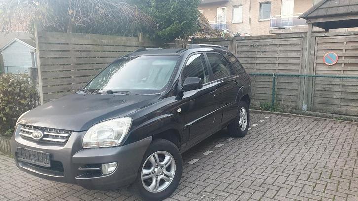 KIA SPORTAGE 2.0-BENZINE -ZWART-MET LEDER TE KOOP, Auto's, Kia, Particulier, Sportage, 4x4, Airbags, Airconditioning, Alarm, Centrale vergrendeling