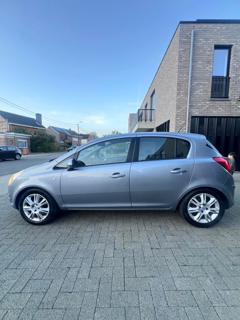 Opel corsa 1.2i Airco 95.000km 1ste eigenaar Gekeurd vvk, Euro 5, 63 kW, 4 cilinders, 1229 cc