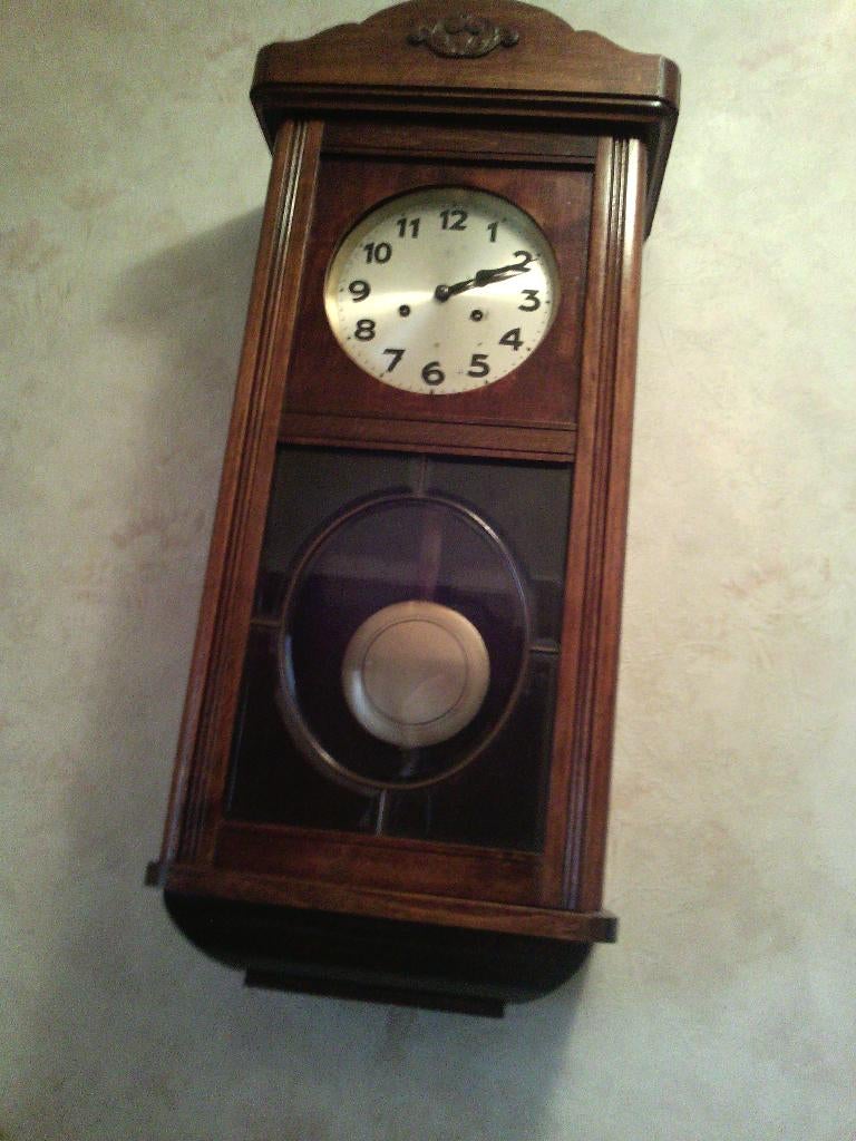 Houten hangklok, Ophalen