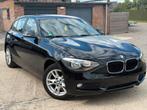 BMW 1 SERIE ✅1 REEKS 114i  GARANTIE BENZINE CARPLAY, Auto's, 4 cilinders, Zwart, 130 g/km, Dealer onderhouden