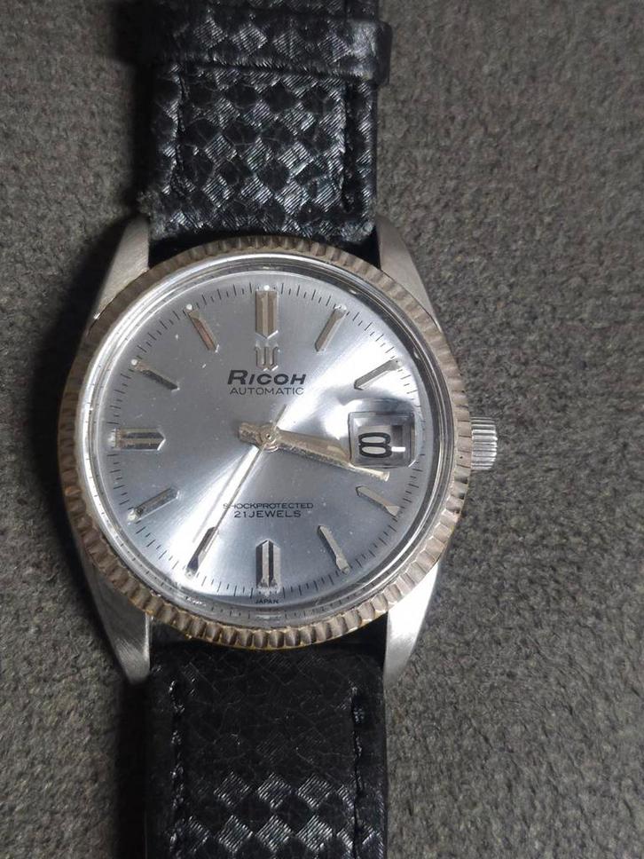 Ricoh horloge, Handtassen en Accessoires, Horloges | Heren, Gebruikt, Polshorloge, Overige merken, Staal, Leer, Ophalen of Verzenden