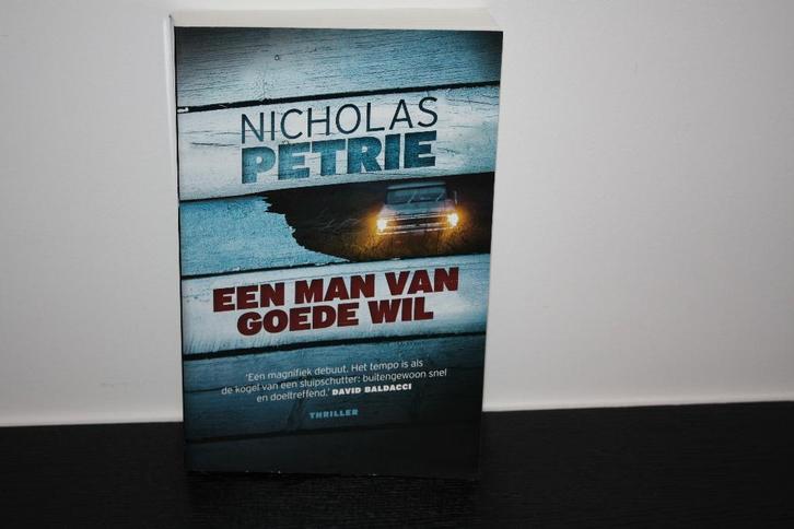 Boek: Een man van goede wil, Nicholas Petrie, Boeken, Thrillers, Zo goed als nieuw, Ophalen of Verzenden