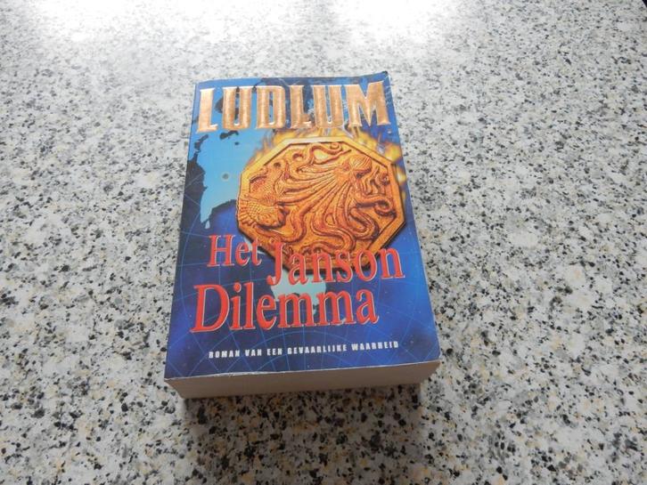 nr.470 - Het janson dilemma - Ludlum - roman, Boeken, Romans, Ophalen of Verzenden