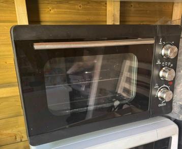 Quigg oven met verschillende functie,in heel.goede staat beschikbaar voor biedingen