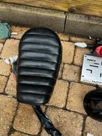 Monkey lowrider zadel, Enlèvement, Selle