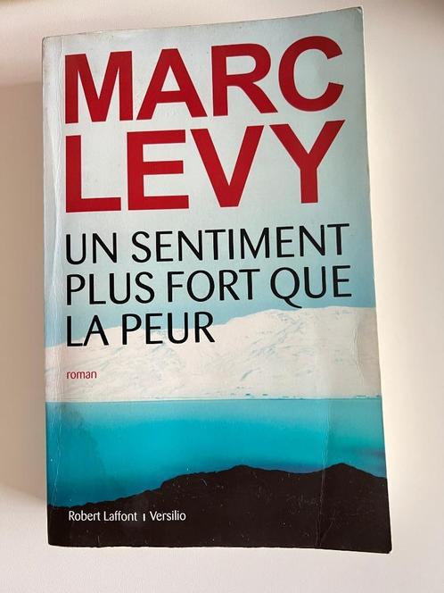 Livre Un sentiment plus fort que la peur de Marc Levy, Boeken, Romans, Gelezen, Europa overig, Ophalen of Verzenden