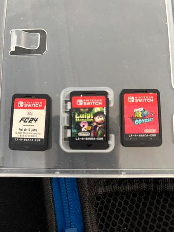 3 nintendo switch games met Opbergdoos beschikbaar voor biedingen