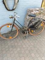 Antieke dames fiets, Ophalen
