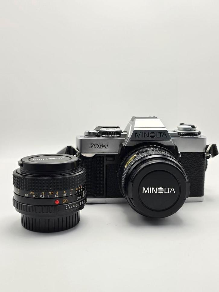 Minolta XG-1 SLR kit met 50mm en 28mm, TV, Hi-fi & Vidéo, Appareils photo analogiques, Comme neuf, Reflex miroir, Minolta, Enlèvement ou Envoi