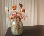Vaas met mooie droogbloemen, Ophalen
