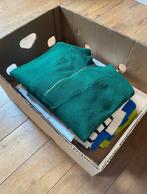 Volle doos met kleren, Ophalen, Gedragen