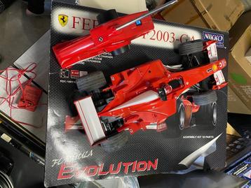 Modelwagen Ferrari F2003-GA 1:10 disponible aux enchères