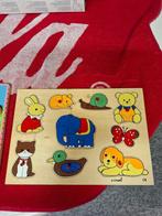 Houten insteek puzzel, Ophalen