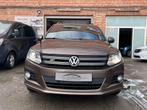 Volkswagen Tiguan 1.4 TSI Sport R-Line 4Motion 160pk, Auto's, Euro 5, 4 cilinders, Bruin, Leder