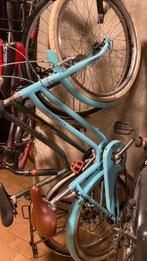 Blauwe meisjeskinderfiets, Ophalen