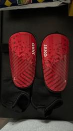 Rode scheenbeschermers Jako (XS), Sports & Fitness, Football, Enlèvement, Comme neuf, Autres types