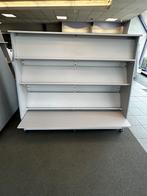 Winkelinrichting: boekenrek, Ophalen