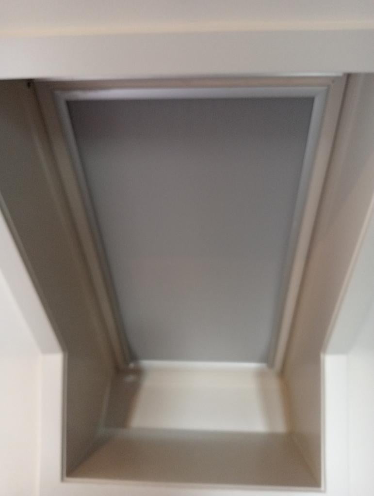 velux rolgordijn, Ophalen