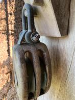 Katrollen hout, Ophalen