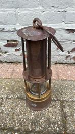 Mijnwerkerslamp, Ophalen