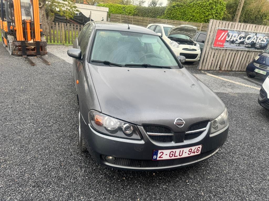 Te koop nissan almera, Auto's, Nissan, Zwart, 4 cilinders, 72 kW, 1317 kg