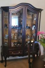 Retro vitrinekast, Ophalen