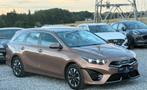 Kia Ceed SW 1.6 GDi PHEV PRESTIGE - CARNET COMPLET - TVAC, Auto's, Automaat, Stof, USB, 5 deurs