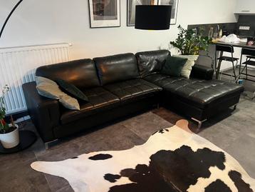 Lederen hoekzetel met lounge beschikbaar voor biedingen