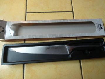 Vleesmes met een lemmet van 20 cm beschikbaar voor biedingen