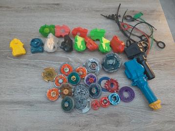 Beyblade met accessoires.  beschikbaar voor biedingen