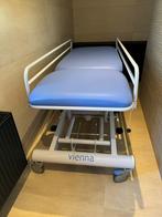 Lopital Vienna hydraulisch verrijdbare verzorgingstafel, Ophalen