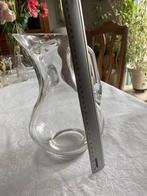 Cruche en verre, Ophalen