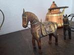 antiek houten paarden, Ophalen