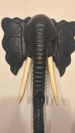 Houten beeld, Ophalen