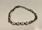 Goudkleurige schakelarmband met letters LOVE, Ophalen of Verzenden, Gebruikt, Goud