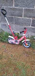Kinderfiets tussen 10-12 inch met fietsduwstang, Ophalen, Gebruikt