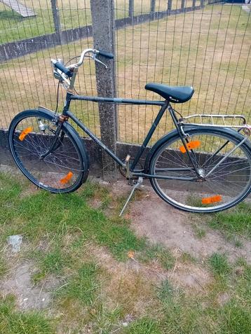 Herenfiets zonder versnellingen rijdt erg goed en heeft o-re beschikbaar voor biedingen