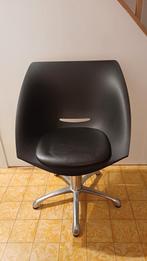 Zwarte kappersstoel met pomp, Ophalen