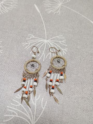 Boucles d'oreilles attrape-rêves, Enlèvement ou Envoi