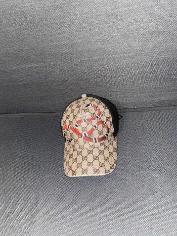 Gucci pet monogram met slangendesign beschikbaar voor biedingen