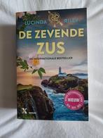 Boek "De zevende zus" van Lucinda Riley - nieuwstaat!, Boeken, Romans, Ophalen of Verzenden