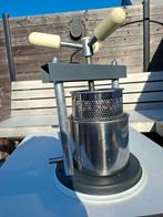 Manuele fruitpers/druivenpers, Ophalen