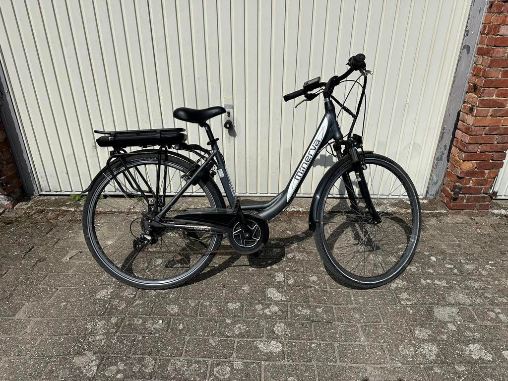 Elektrische damesfiets Minerva, Fietsen en Brommers, Ophalen, Zo goed als nieuw