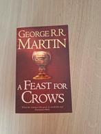 Boek George Martin A feast gor crows, Ophalen of Verzenden, Zo goed als nieuw, George  RR Martin