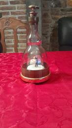 Ancienne carafe à liqueurs et musicale, Enlèvement