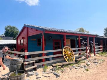 Écurie pour chevaux avec sellier ou « club room »