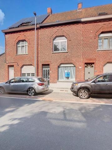 Centraal gelegen tussenwoning in Roeselare met uitweg beschikbaar voor biedingen